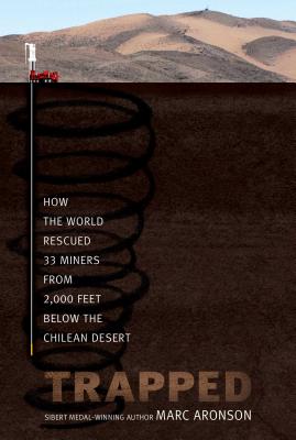 Cover Image for Trapped: How the World Rescued 33 Miners from 2,000 Feet Below the Chilean Desert -- Marc Aronson, Paperback
