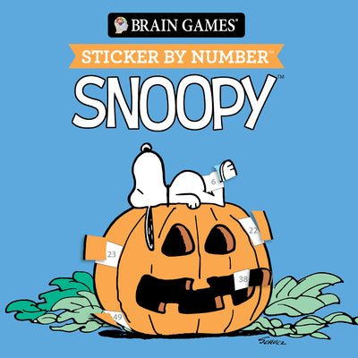 Cover Image for Brain Games - Sticker by Number Compact Edition: Snoopy 7x7 Inches Cozy Fall Craft, Travel Size Activity Book for Adults & Kids 7+ Officially Licensed -- Publications International Ltd, Paperback